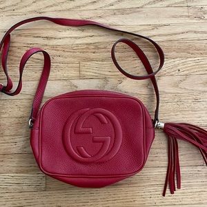 red gucci crossbody with tassel